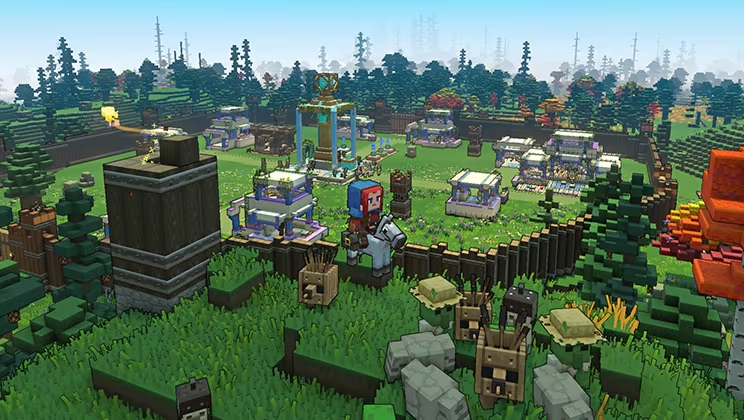 The player character in Minecraft Legends builds defenses, including towers and wooden fences, to resist the Piglin invasion. 